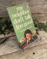 "My Neighbour Don't Talk Too Good" by Wally Metts
