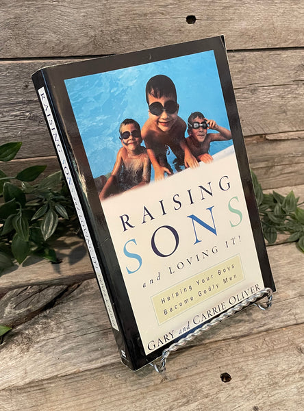 "Raising Sons and Loving It! Helping Your Boys Become Godly Men" by Gary and Carrie Oliver